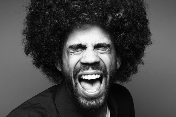 Screaming black man on black and white tone - Photo, image