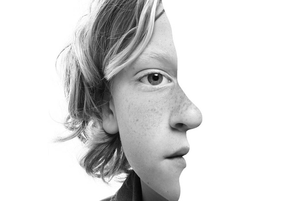 Part of little serious boy on black and white tone - Fotografie, Obrázek