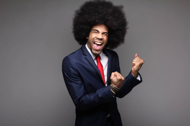 Screaming black businessman posing - Valokuva, kuva