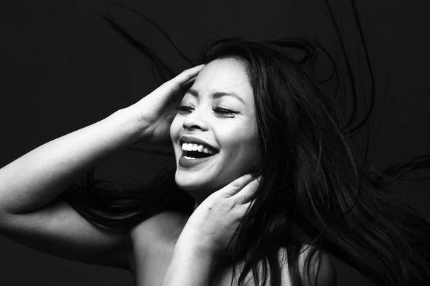 Smiling asian young woman on black and white tone - Фото, зображення
