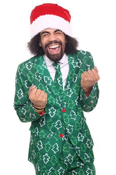 Happy black man in Christmas clothes - Фото, изображение