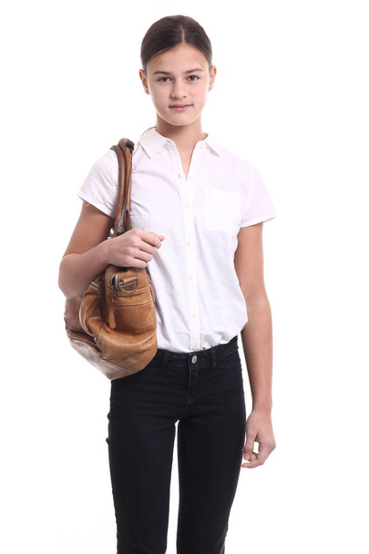 Beautiful caucasian teenage girl with bag - 写真・画像