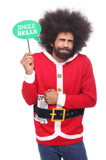 Black man holding Jingle Bells sign - Zdjęcie, obraz