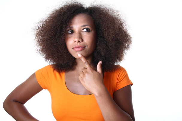 Beautiful afro-american woman is thinking about something - 写真・画像