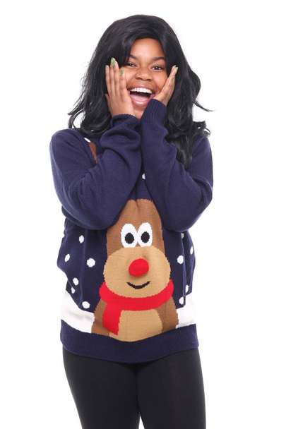 Beautiful afro-american woman is wearing christmas clothes - Foto, immagini