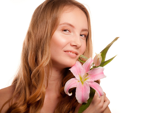 Beautiful girl with a flower lily - Фото, зображення