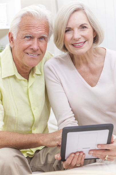 Senior Man & Woman Couple Using Tablet Computer - Photo, Image