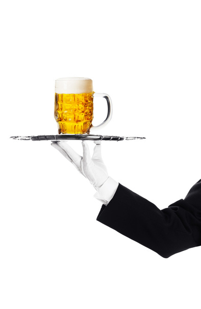 Waiter holding a tray with a beer glass - Photo, Image