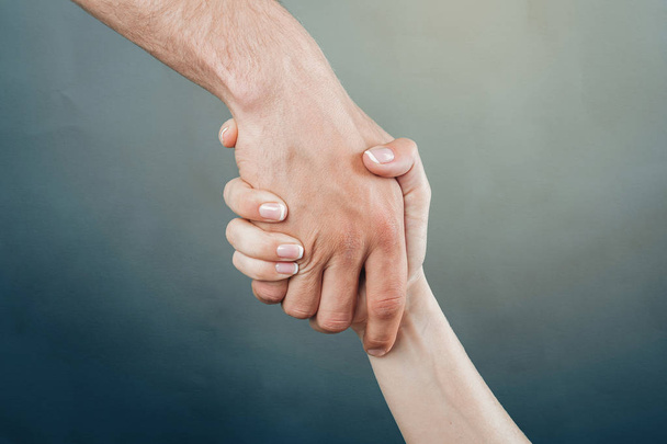 close up of Shaking hands of two people - Φωτογραφία, εικόνα