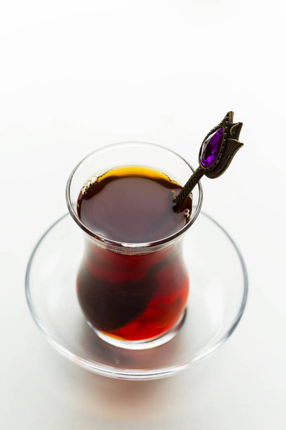 Turkish tea in traditional glass isolated on white background - 写真・画像