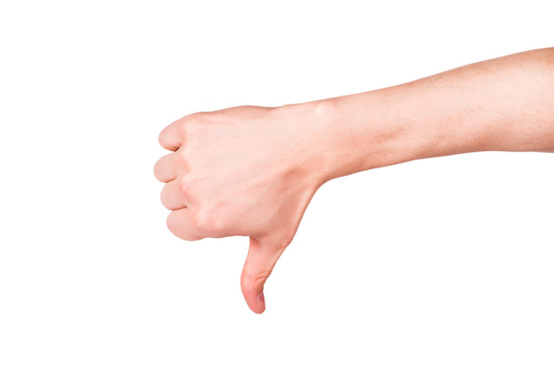 Male hand with a thumb down. Negative attitude, fail concept - Fotografie, Obrázek