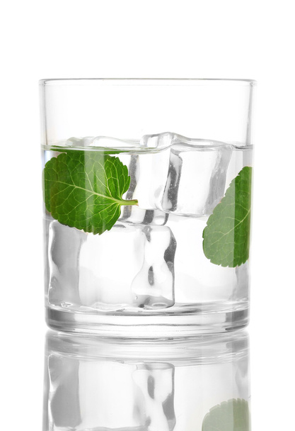 Glass of water with ice, mint and lime isolated on white - Foto, afbeelding