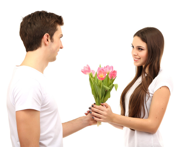 Loving couple with tulips isolated on white - Zdjęcie, obraz