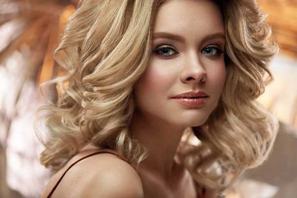 Hair Style And Makeup. Beautiful Blonde Woman With Volume Hair - Photo, image