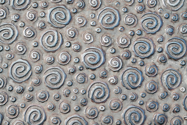 Vortex pattern on corrugated metal surface. Underfoot metal texture - Photo, Image