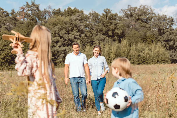 happy young family spending time together in nature - Photo, Image