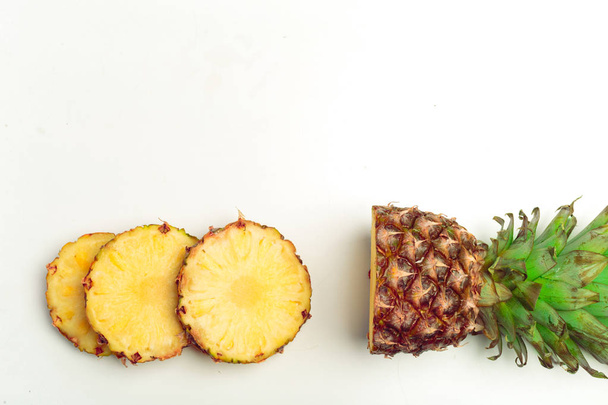 cut pineapple isolated on white background - Valokuva, kuva