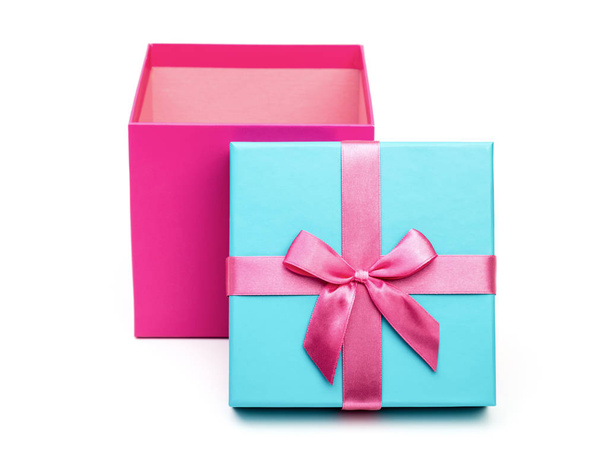 Open pink box with a gift and bow isolated on white background - Fotoğraf, Görsel
