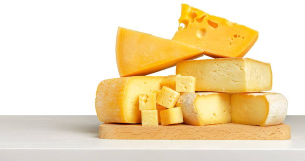 Delicious cheese on the table - Fotoğraf, Görsel