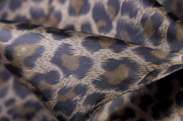 Zamknij widok leopard wzorzyste tkaniny jako tło - Zdjęcie, obraz