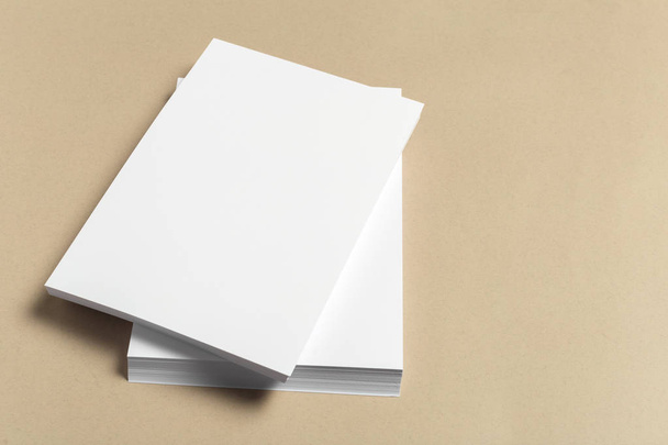 White business card on wooden table. Blank portrait A4. - Valokuva, kuva