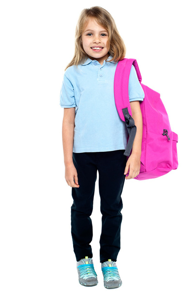 Happy little girl carrying school bag - Fotoğraf, Görsel
