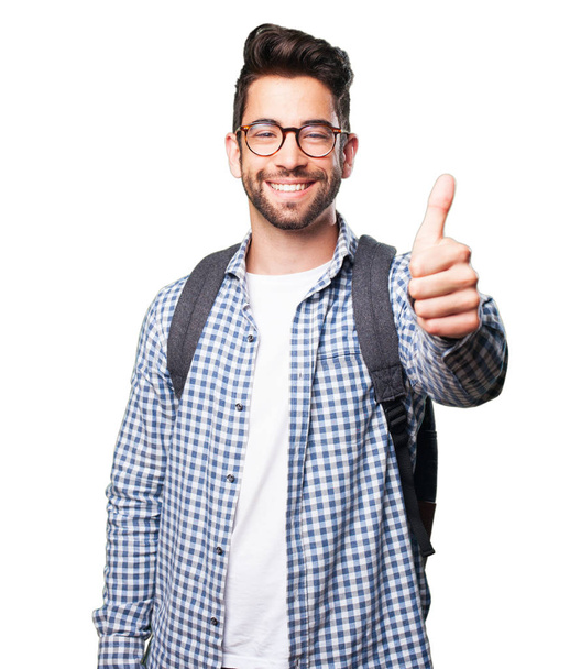 student man doing okay gesture isolated on white background - Foto, Imagen
