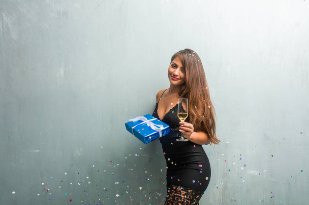 Young latin woman celebrating new year  - Foto, afbeelding