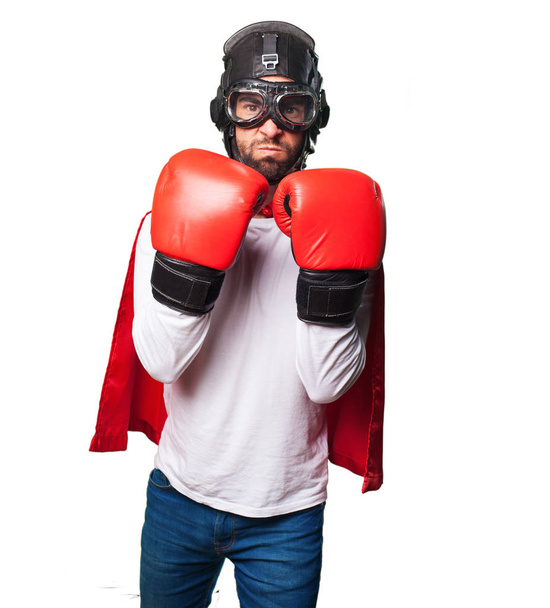 super hero wearing boxing gloves isolated on white background - Photo, Image