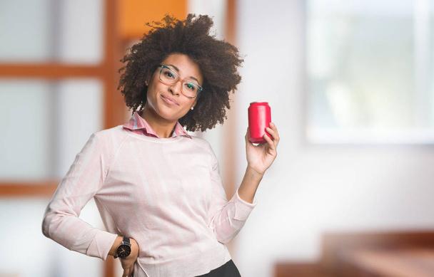 black woman holding coke, selective focus - Foto, Bild