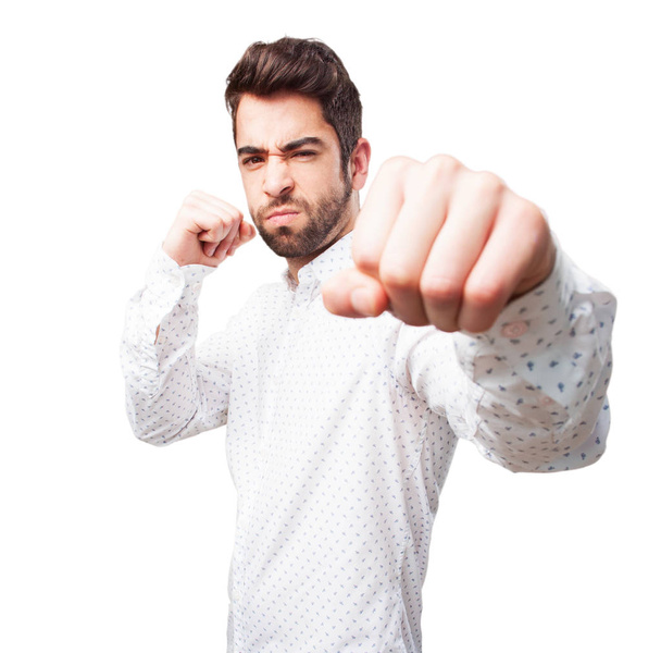 man doing punching gesture isolated on white background - Foto, Imagen