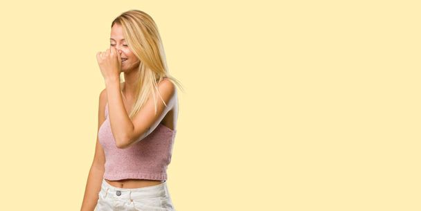 Portrait of young pretty blonde woman laughing and having fun - Фото, изображение