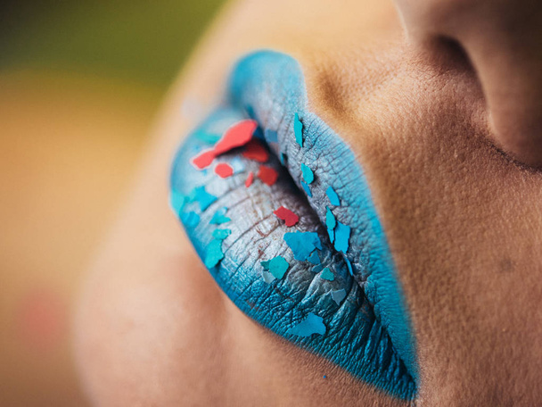 Fashion and beauty. Creative lip makeup. Artistic make-up. Beautiful macro shot of female plump lips. - Foto, afbeelding