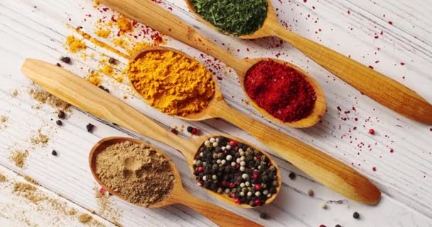 Spoons with colorful mix of spices - Footage, Video
