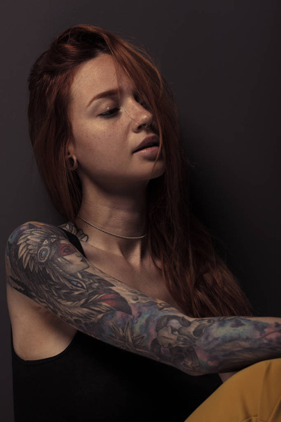 studio shot of pretty redhead girl  - Фото, изображение