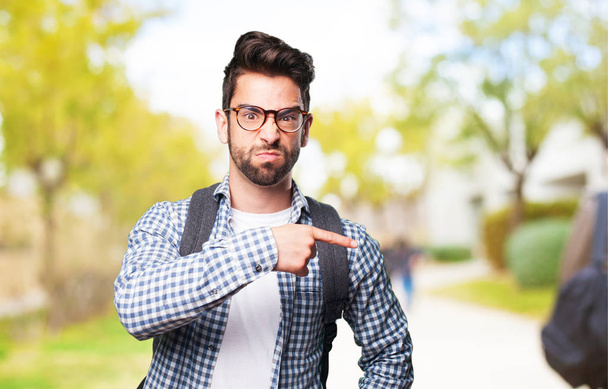 angry student man pointing space - Photo, Image