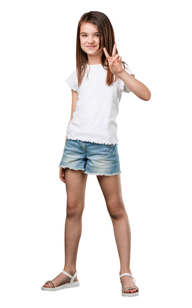 Menina de corpo inteiro mostrando número dois, símbolo de contagem, conceito de matemática, confiante e alegre
 - Foto, Imagem