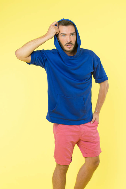 Man athletic appearance wear stylish clothes for youth. Comfortable outfit for active leisure. Clothing for active lifestyle. Choose comfortable clothes made out of soft textile to stay active - 写真・画像