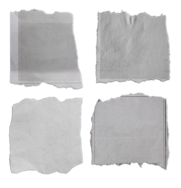 Vier stukken gescheurd papier op effen ondergrond  - Foto, afbeelding