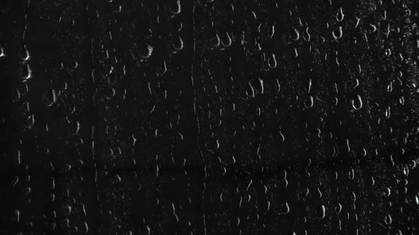 Textura de gotas sobre fundo preto, vídeo 4k
 - Filmagem, Vídeo
