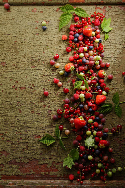 Wooden background with summer berries mix - Zdjęcie, obraz