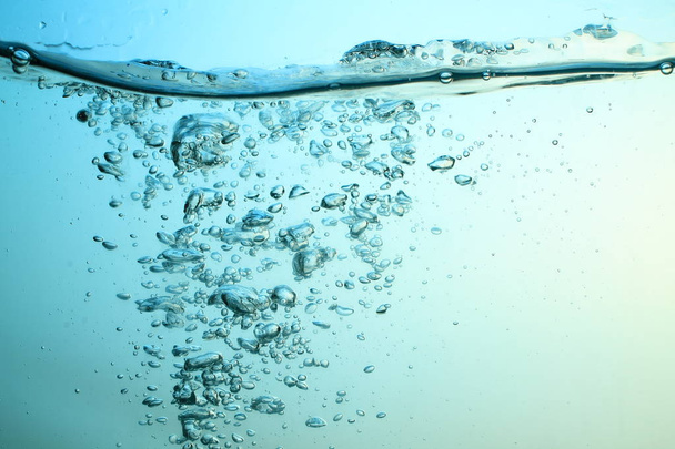 zoet water met bubbles textuur achtergrond - Foto, afbeelding