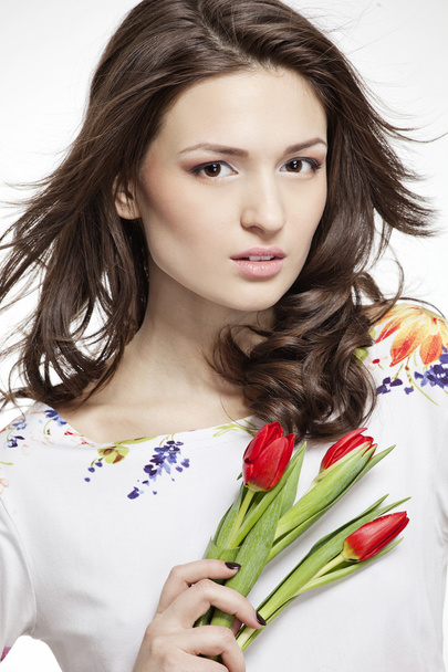 beautiful smiling woman with flowers - Zdjęcie, obraz
