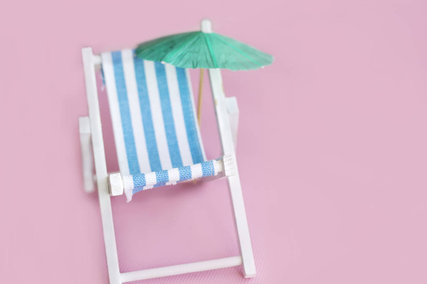 Deck Chair and Sun Umbrella on the Beach - Photo, image