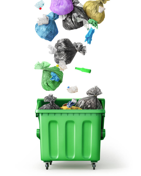 Garbage falls into a trash can on a white background - Фото, зображення