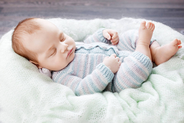 Portrait of sleeping newborn baby boy - Фото, изображение