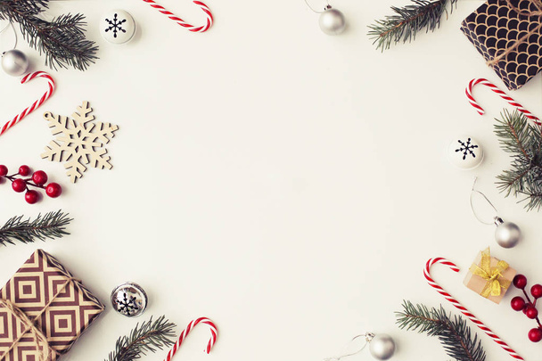 Christmas decorative ornaments on pastel background in vintage style - Fotó, kép