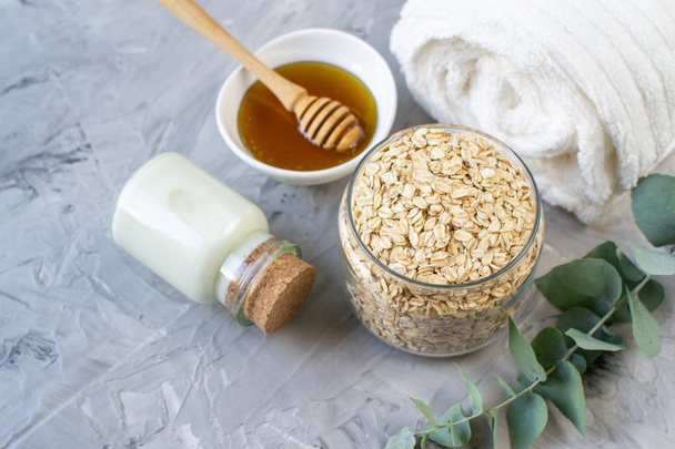 Natural Ingredients Homemade Body Oatmeal Sea Salt Scrub with Olive Oil Honey Milk White Towel Beauty Concept Skincare Organic Aroma Spa Therapy - Photo, Image