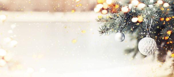 Closeup view of christmas tree with decoration ball, holiday background - 写真・画像