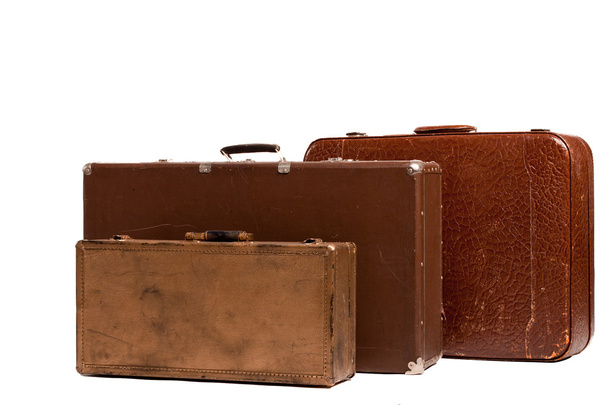 Vintage weathered leather suitcases on top of each other - Foto, immagini